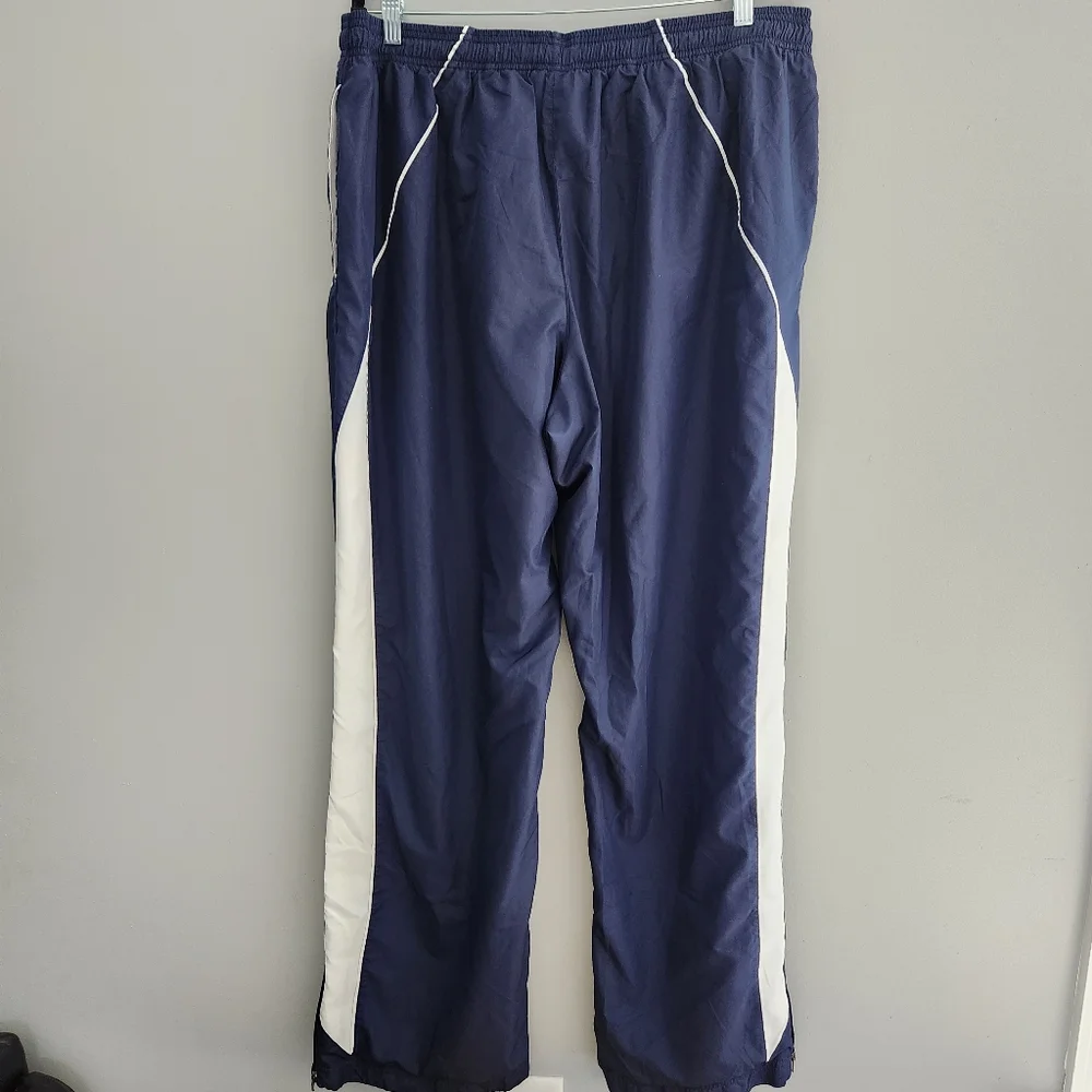 Men's Blue Under Amour Loose Athletic Pants with White Side Stripe and Zipper